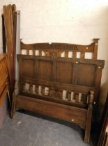 A 17thC style oak head and tail board and a further Victorian Art Nouveau style head and tail board.