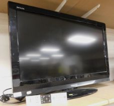 A Toshiba flat screen television, model number 32AV615DB, with remote control.