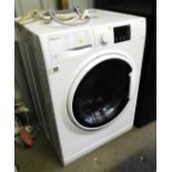 A Hotpoint 8kg washing machine.