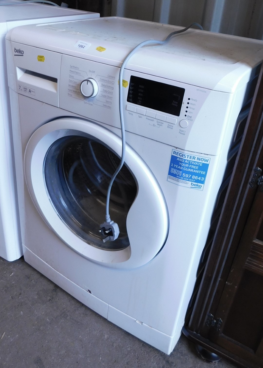 A Beko 7kg washing machine, WM74165W.