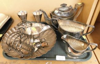 A silver plated three piece tea service, together with toast racks, gravy boat, goblets, etc. (1 tra