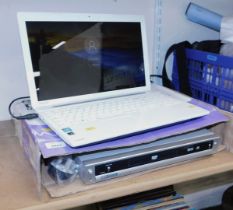 A Toshiba satellite C55-A-1R6 laptop computer, together with a 237 DVD player by Acoustic Solutions,