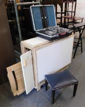 A beech and melamine drop leaf kitchen table, together with a briefcase and stool. (3)