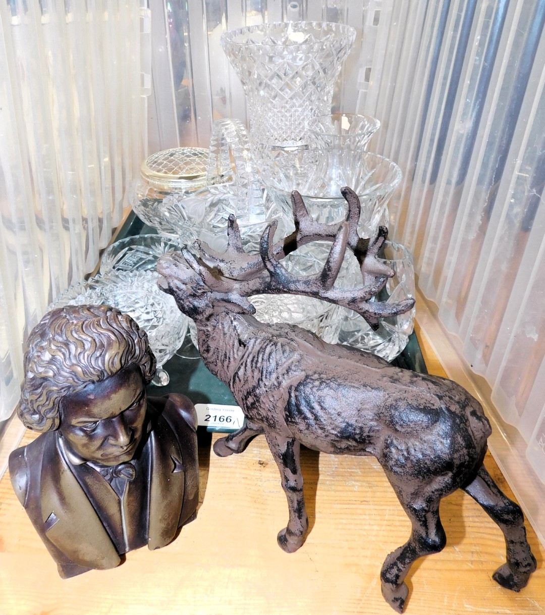 A bust of Beethoven, bronzed model of a reindeer, and glassware including a vase, glass basket, bowl