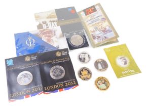 Collectors coins, comprising two Countdown to London 2012 five pound coins, a Disney's Peter Pan fif