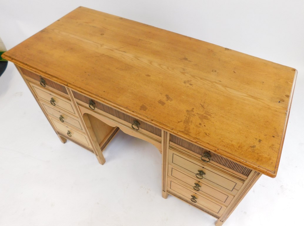 An early 20thC blonde ash pedestal desk by Shoolbred and Co, the top with a moulded edge above centr - Image 2 of 5