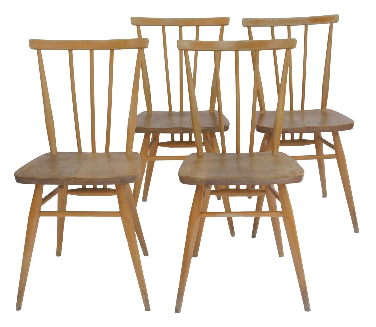 A set of four Ercol light elm dining chairs, model no. 391, bearing label to one chair. (AF)