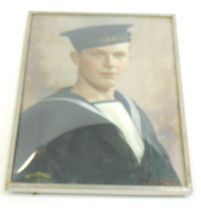 An early 20thC hand tinted photograph depicting a sailor, indistinctly signed, and attributed to Ret