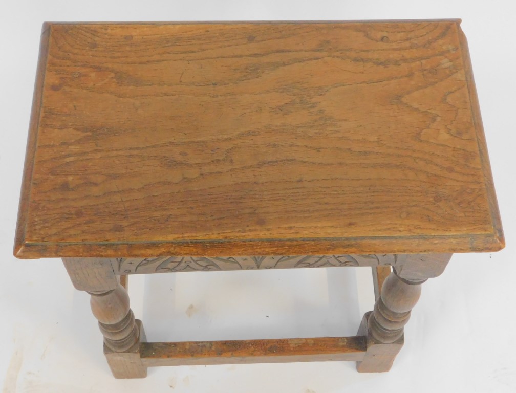 An early 20thC oak joint stool in Charles I style, the rectangular top with a moulded edge above car - Image 2 of 2
