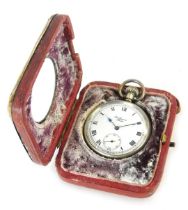 An Edward VII silver cased travel clock, the scroll silver border with maker RB&M, Birmingham 1905,