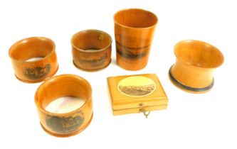 A group of Mauchline ware, comprising three napkin rings for Shakespeare's House, The Ancient Entran