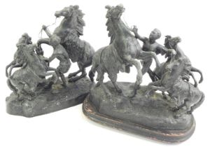 After Guillame Coustou. A pair of late 19thC spelter Marley horse figure groups, one on an ebonised