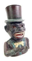 A 20thC cast iron money bank, modelled as a gentleman wearing a hat, 22cm high.