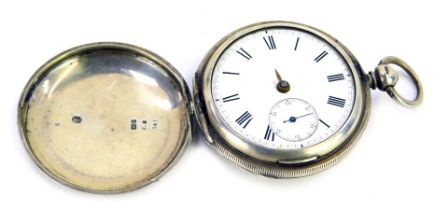 A silver full Hunter pocket watch, with white enamel Roman numeric dial, seconds dial and gold hands
