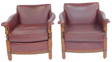 Two 1930s lounge chairs, upholstered in red leatherette fabric, with stud work. The upholstery in t