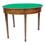 A George III walnut demi lune card table, with rosewood cross banding, opening to reveal a baize int