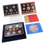 Three Royal Mint collectors coin packs, comprising 2004, 1996 and 2003, each in fitted case.