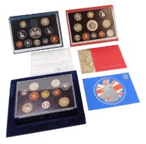 Three Royal Mint collectors coin packs, comprising 2004, 1996 and 2003, each in fitted case.