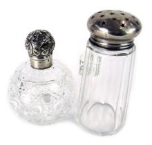 Two silver topped and pressed glass items, comprising a cut glass and silver lidded sugar sifter, Bi