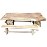 A large tree root table, the rectangular top raised on two tree root supports, 80cm high, the top ap