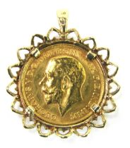 A George V gold full sovereign 1913, spectacle set to a 9ct gold pendant mount, 11.7g all in.