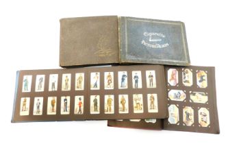 Four cigarette card albums, containing cards for Park Drive, The Navy, Gallagher Famous Jockeys, Pla