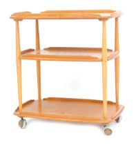 An Ercol light elm three tier trolley, each tier with a raised edge, on castors, model number 458, 7