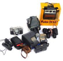 Camera and optics equipment, comprising a boxed Kodak EK100 camera, Boots 8x30 binoculars, a Polaroi