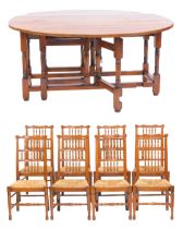 A 20thC oak and elm dining suite, comprising gate leg table, 78cm high, 156.5cm wide, 66cm deep, ext