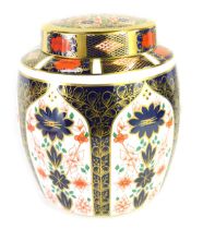 A Royal Crown Derby Old Imari porcelain jar, pattern 1128, red printed marks, and matched cover with