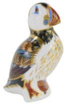 A Royal Crown Derby porcelain paperweight modelled as a puffin, gold stopper and red printed marks,