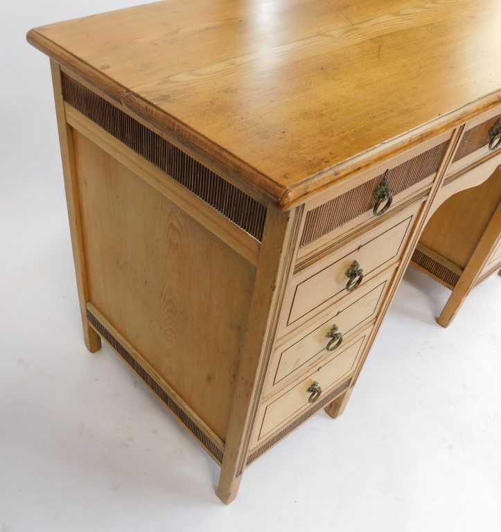 An early 20thC blonde ash pedestal desk by Shoolbred and Co, the top with a moulded edge above centr - Image 3 of 5