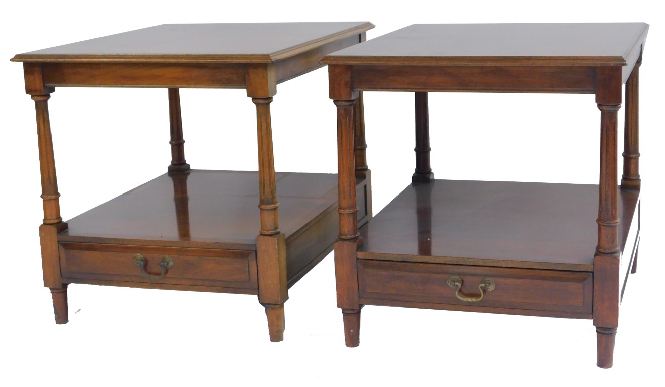 A pair of 20thC mahogany and line inlaid lamp tables, each top with a moulded edge above fluted colu