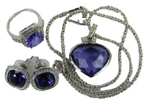 A matched jewellery suite, comprising a Swarovski crystal heart shaped pendant and earring set, each