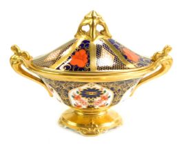 A Royal Crown Derby Old Imari porcelain twin handled pedestal vase and cover, gold ground, pattern