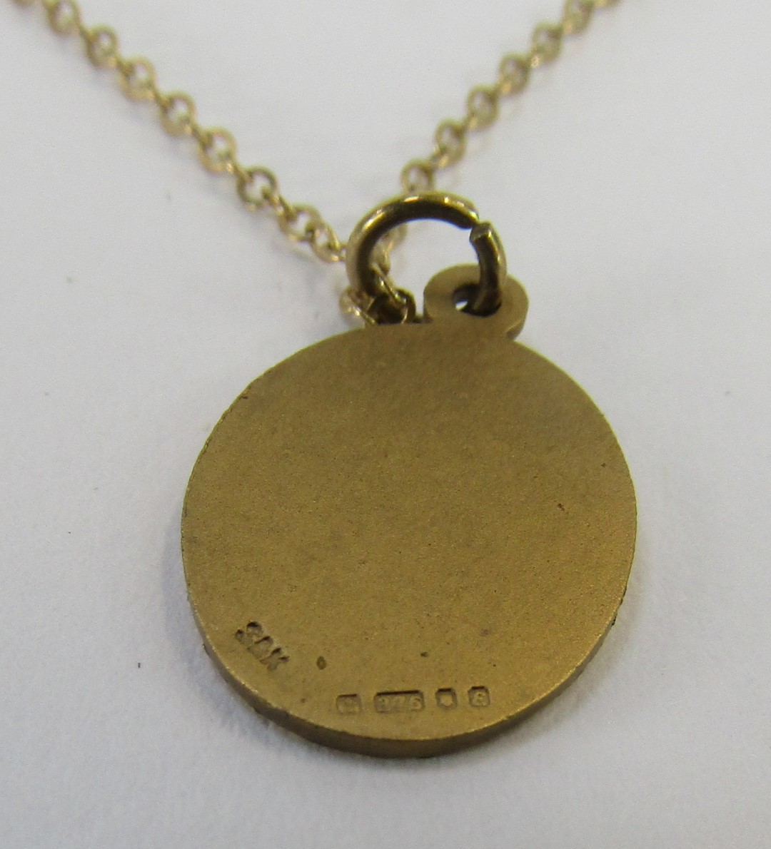 A 9ct gold St Christopher pendant on fine link chain, the pendant 1cm high, the chain 44cm long, 2.2 - Image 3 of 3