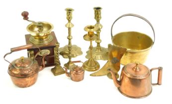 A group of copper and brass ware, to include coffee bean grinder, 18thC style brass candlesticks, mi