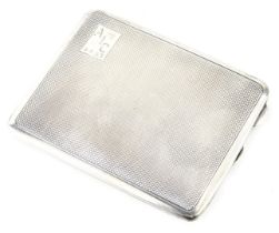 A George V silver cigarette case, of rectangular form with engine turned decoration, bearing the ini