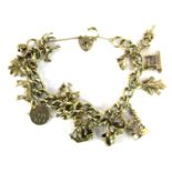 A 9ct gold charm bracelet, with fifteen various charms, safety chain and padlock clasp, 62.6g all in