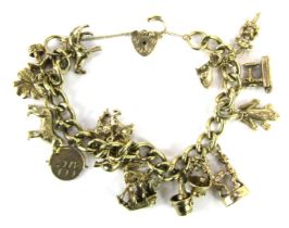A 9ct gold charm bracelet, with fifteen various charms, safety chain and padlock clasp, 62.6g all in