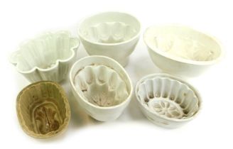 A group of 19thC and later pottery jelly moulds, differing sizes and designs, including Copeland and