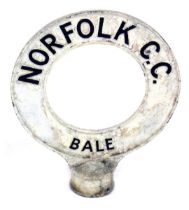 An early 20thC Norfolk CC road sign, for Bale, with a circular loop design on a circular fitting, 39