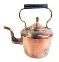 A 19thC copper kettle, with ring handle and brass acorn knop, 33cm high.