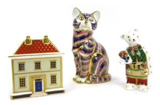 A group of Royal Crown Derby porcelain, comprising Derby cat paperweight, lacking stopper, 13cm high