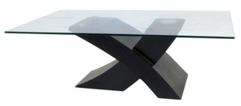 A modern coffee table, the glass rectangular top raised on an ebonised base of abstract X shaped for