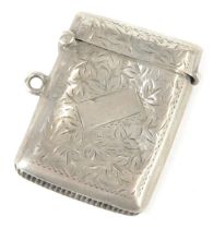 A George V silver Vesta case, of rectangular form with floral engraved decoration and a vacant shiel