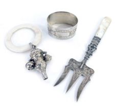 Various silver wares, comprising a Victorian silver and mother of pearl handled pickle fork, a Georg