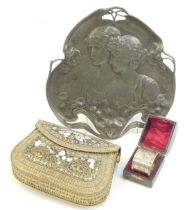 An early 20thC Continental Art Nouveau pewter dish, relief moulded with two female figures amongst f