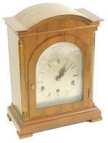 A Thwaites and Reeds of Clerkenwell mahogany cased mantel clock, the silvered arched dial with chapt