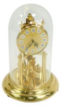 A German Kein brass 400 day anniversary clock, with circular dial bearing Roman numerals, with glass